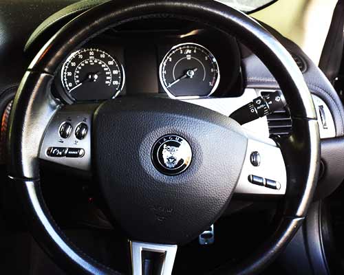 bmw dashboard being check for correct operation of all dials lights and switches