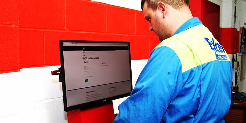 our mot tester inputting mot data into the excel mot test station computer