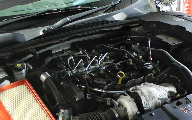 close up of an old car engine being completely serviced at excel automotives in chesterfield