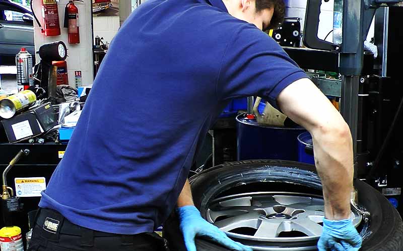 excel tyre fitter fitting a brand new performance volvo tyre