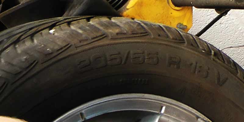 close up of a tyre side wall showing the tyres size to aid in replacent